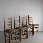 Rustic ladder-back oak chairs with embroidered seats | Netherlands | 1950s