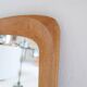 Mid-century modern sculptural wall mirror in stained oak, glass, Glas & Trä 1959