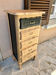 5-drawer black and gold chiffonnier with raw wood