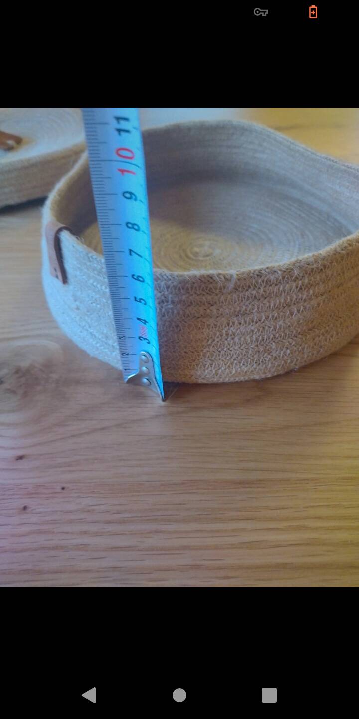 Basket with braided rope and leather lid