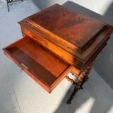 Antique wooden sewing table with drawer.