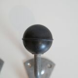 Pair of school coat hooks in Bakelite and metal from the 1950s.