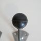 Pair of school coat hooks in Bakelite and metal from the 1950s.