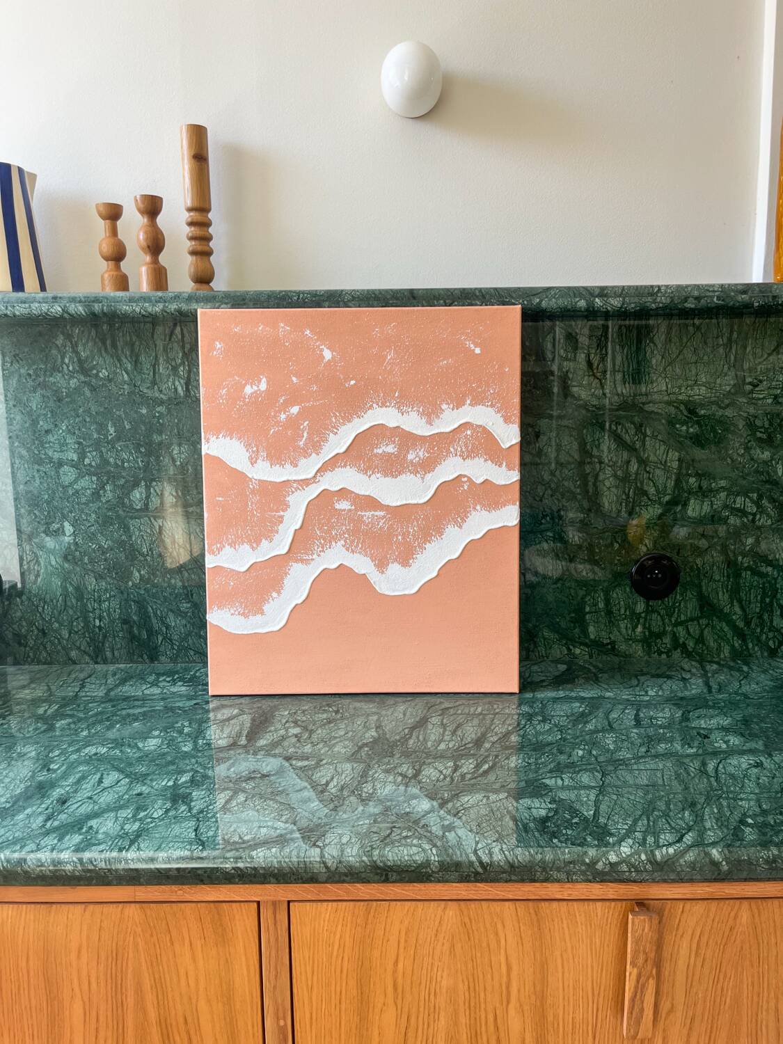 Relief paintings of white coral waves