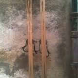 Pair of old skis with its poles