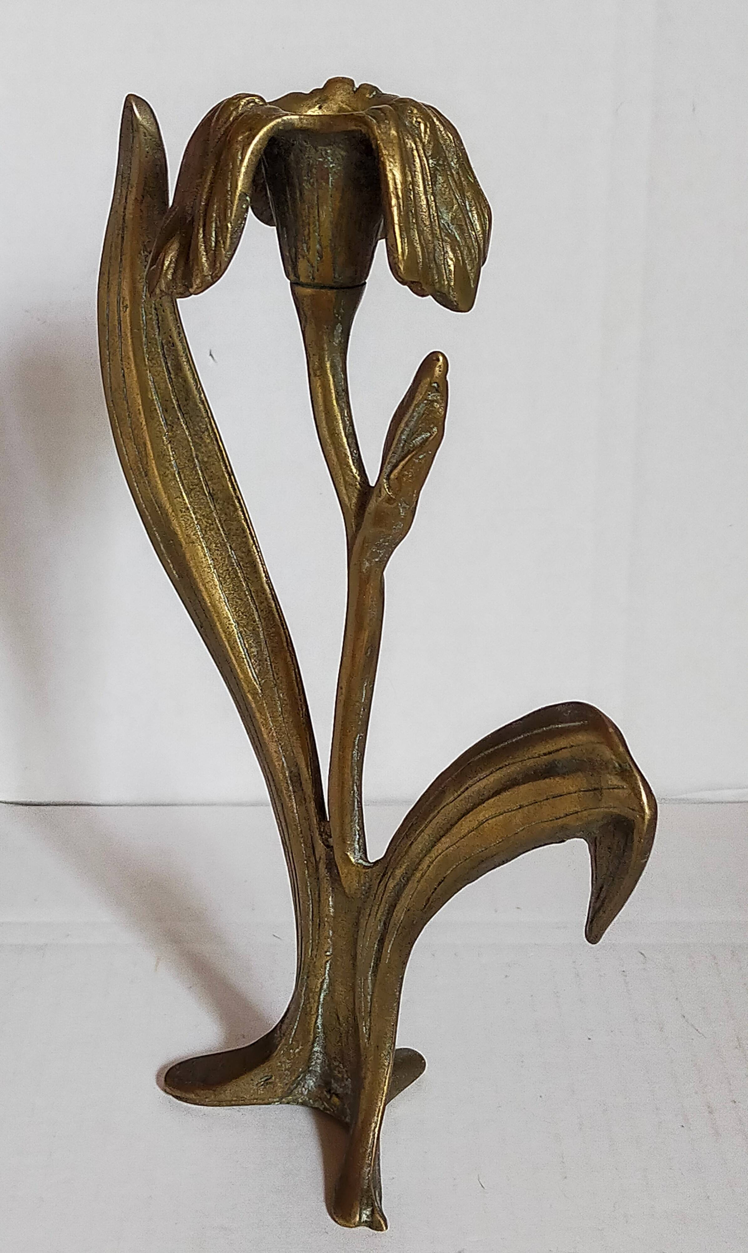 Old iris flower candle holder in solid brass