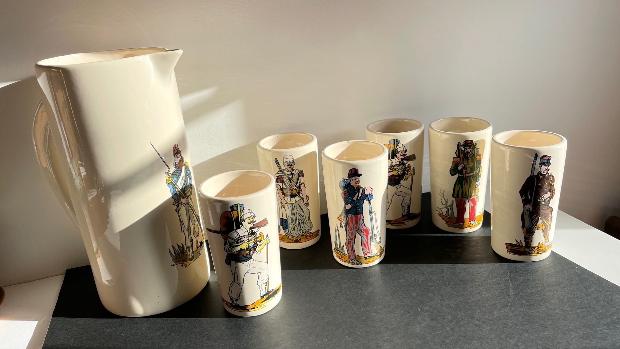 Orangeade service to vintage ceramic soldiers