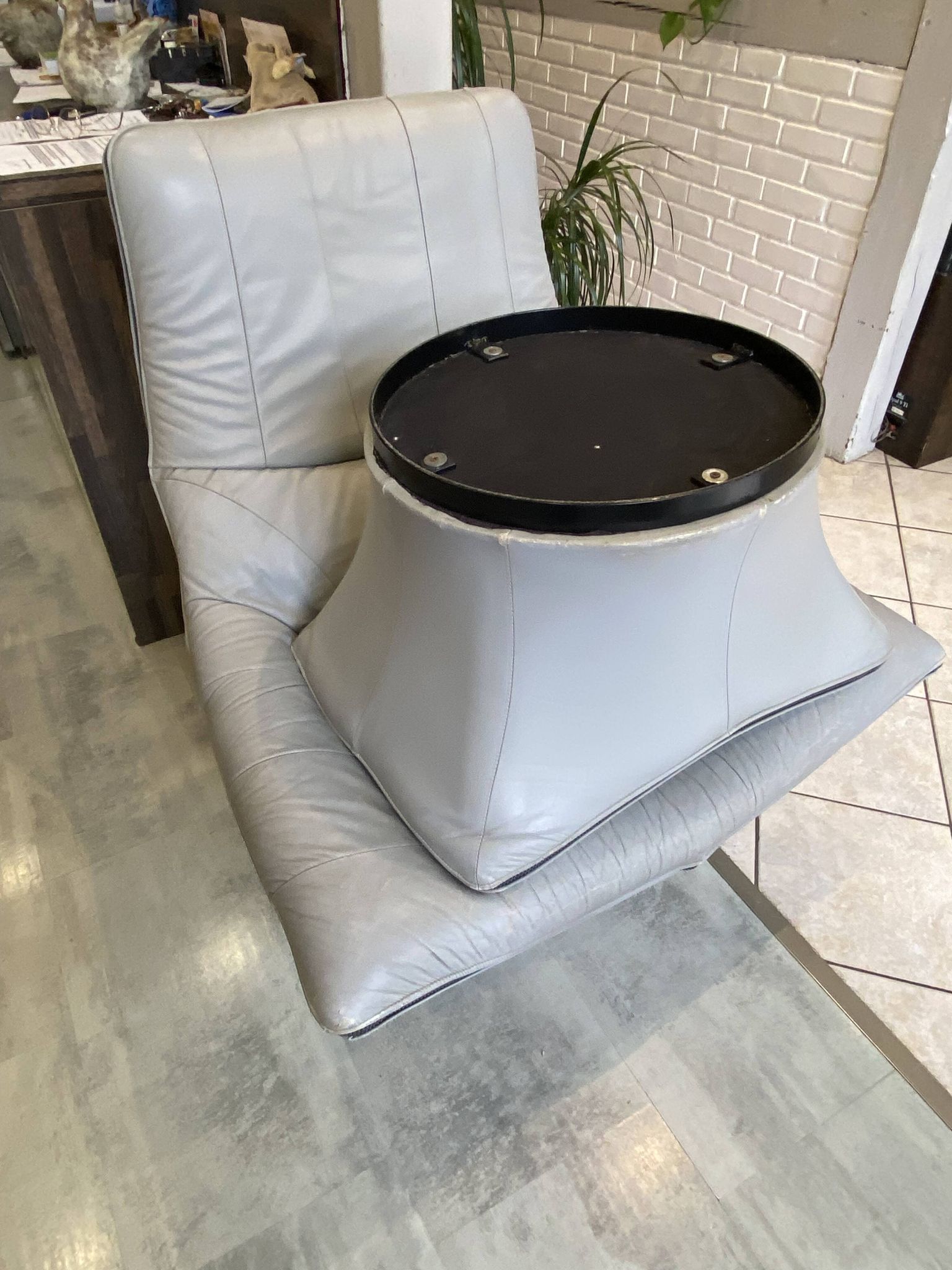 Swivel lounge chair ottoman footrest leather Mantis Gerard Van den Ber