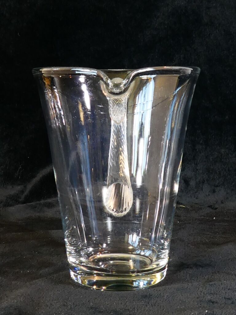 Pitcher Carafe has orangeade em blown glass