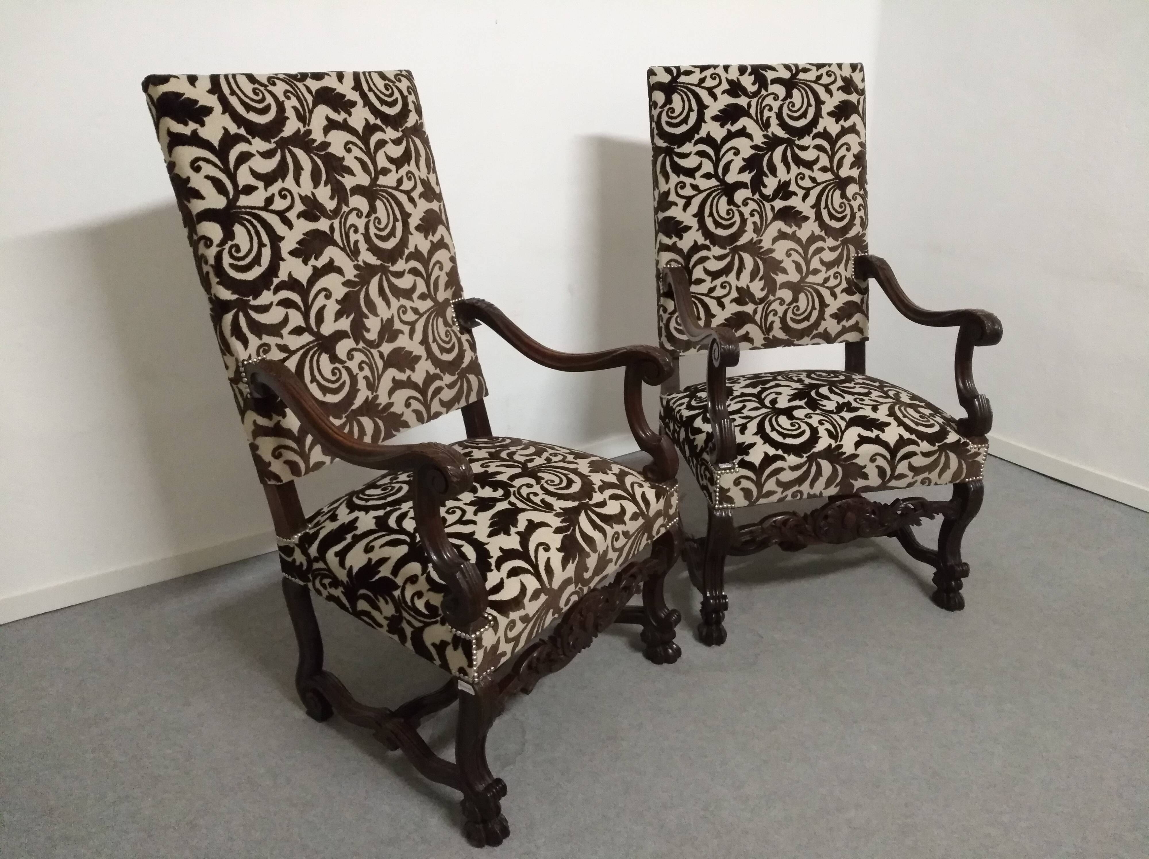 Pair of ceremonial armchairs in blackened oak, France late 18th century.