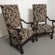 Pair of ceremonial armchairs in blackened oak, France late 18th century.