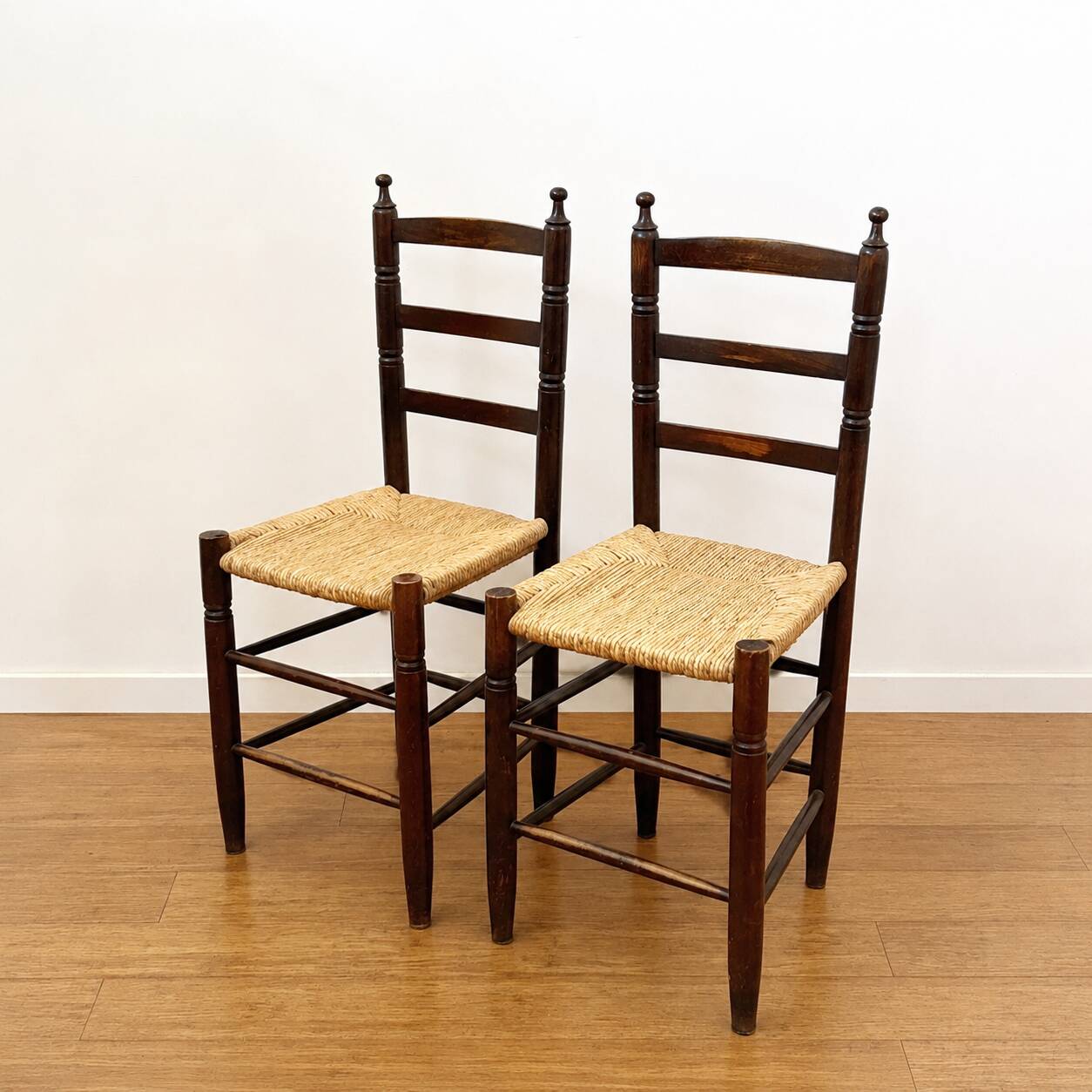 Pair of antique rush-seated chairs in solid wood – France, mid-20th century