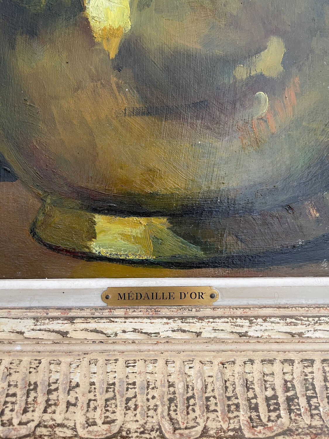 Old wooden table signed with a gold medal.
