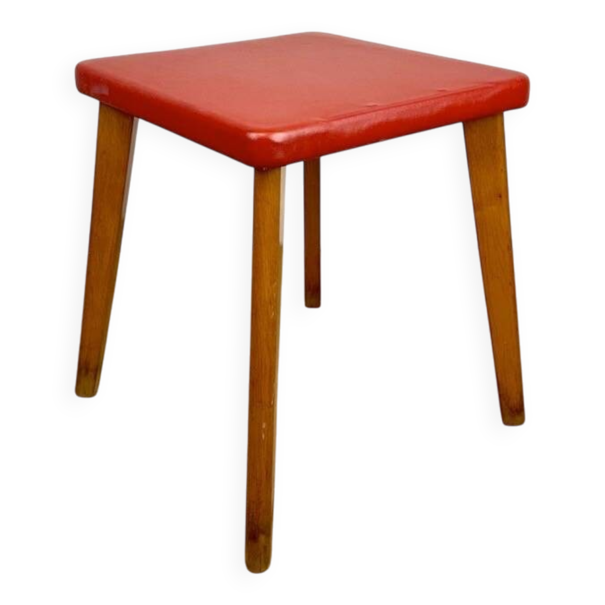Wooden stool with red faux leather from the 1950s.