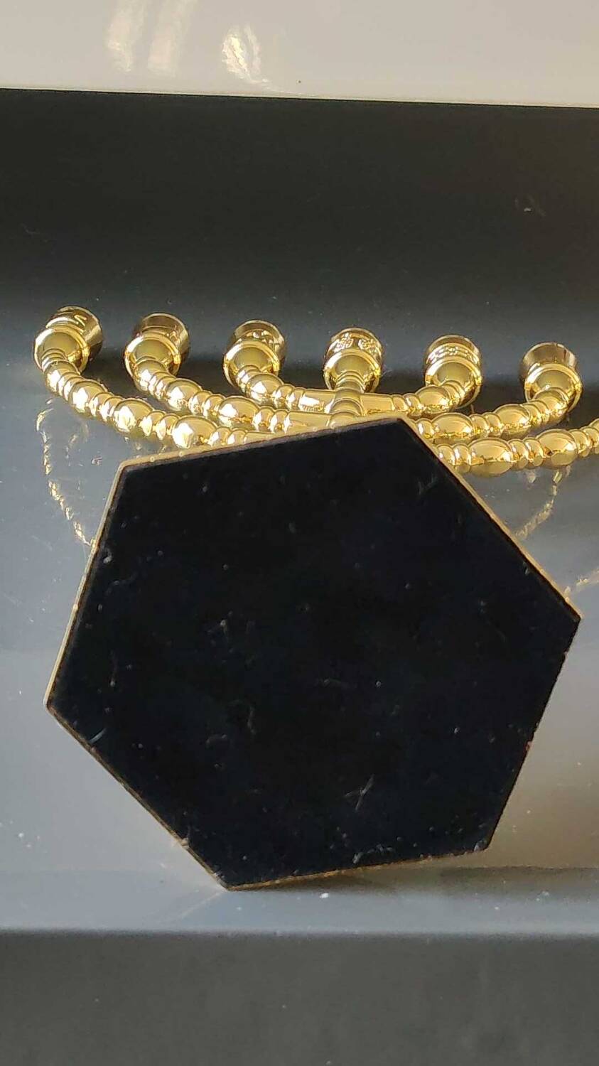 Menorah/Jewish/Hebrew candlestick with 7 arms of light. Engraved with the symbols of the 12 tribes of Israel/Holyland inscription. In gold metal. Size 20 x 16 cm