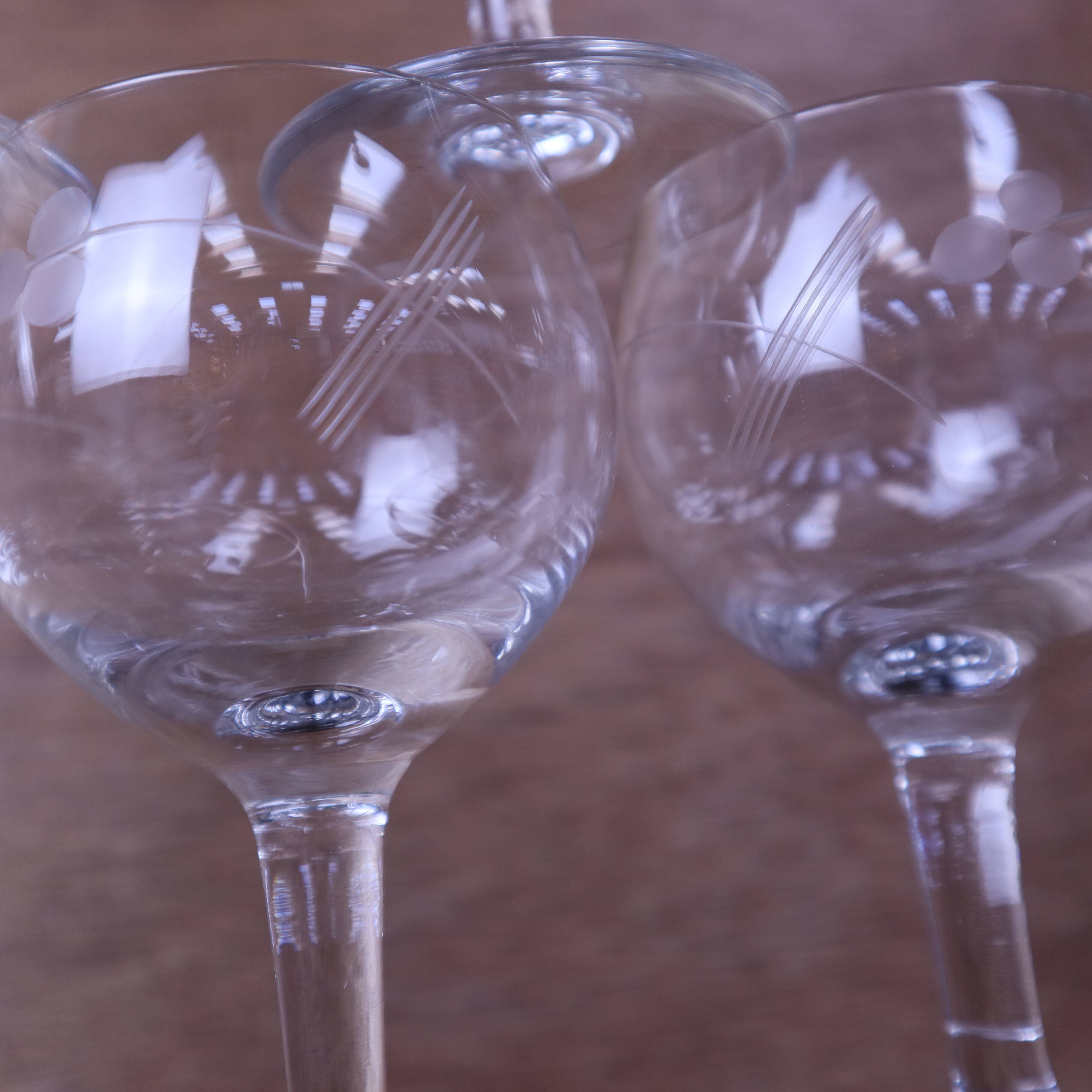 Set of 9 engraved vintage floral balloon white wine glasses.