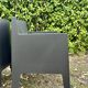 2 black Toy chairs designed by Starck