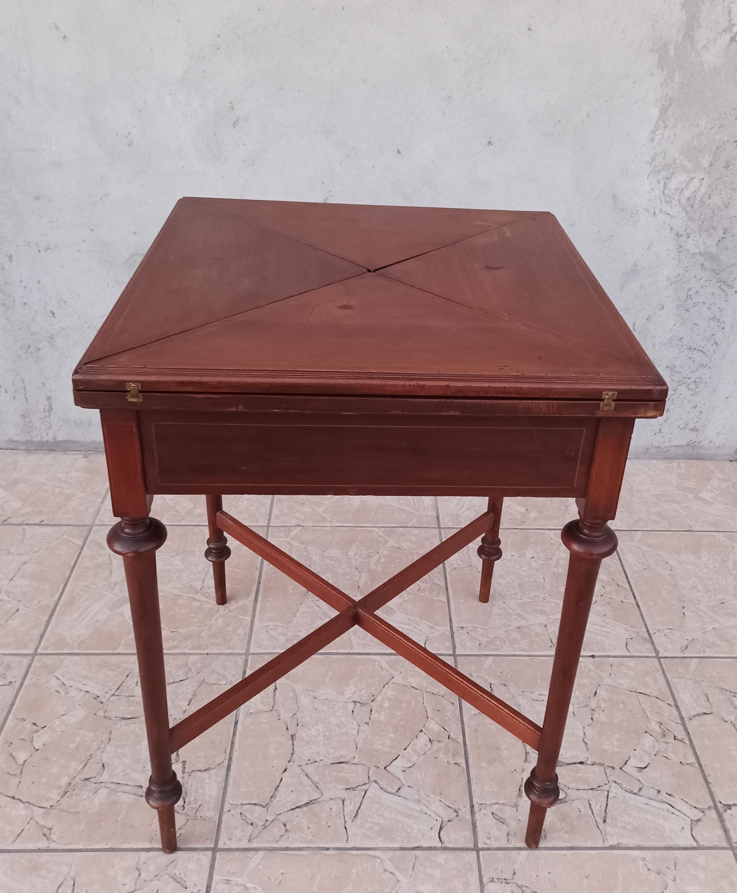 Game table in mahogany late 19th