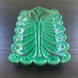 Stylized leaf pocket emptier