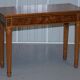 Pair of console tables David Linley 1993 walnut burr