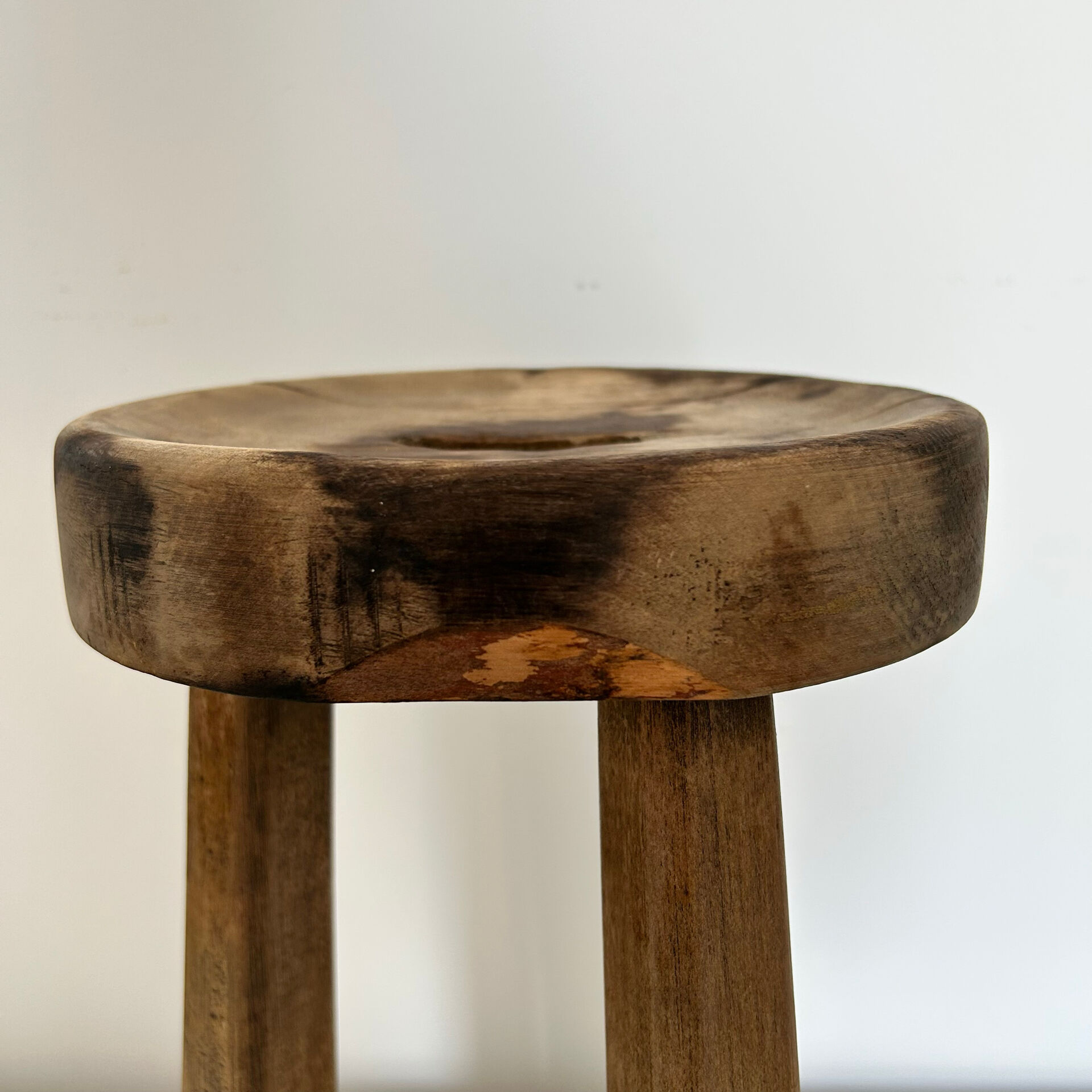 Patinated tripod stool