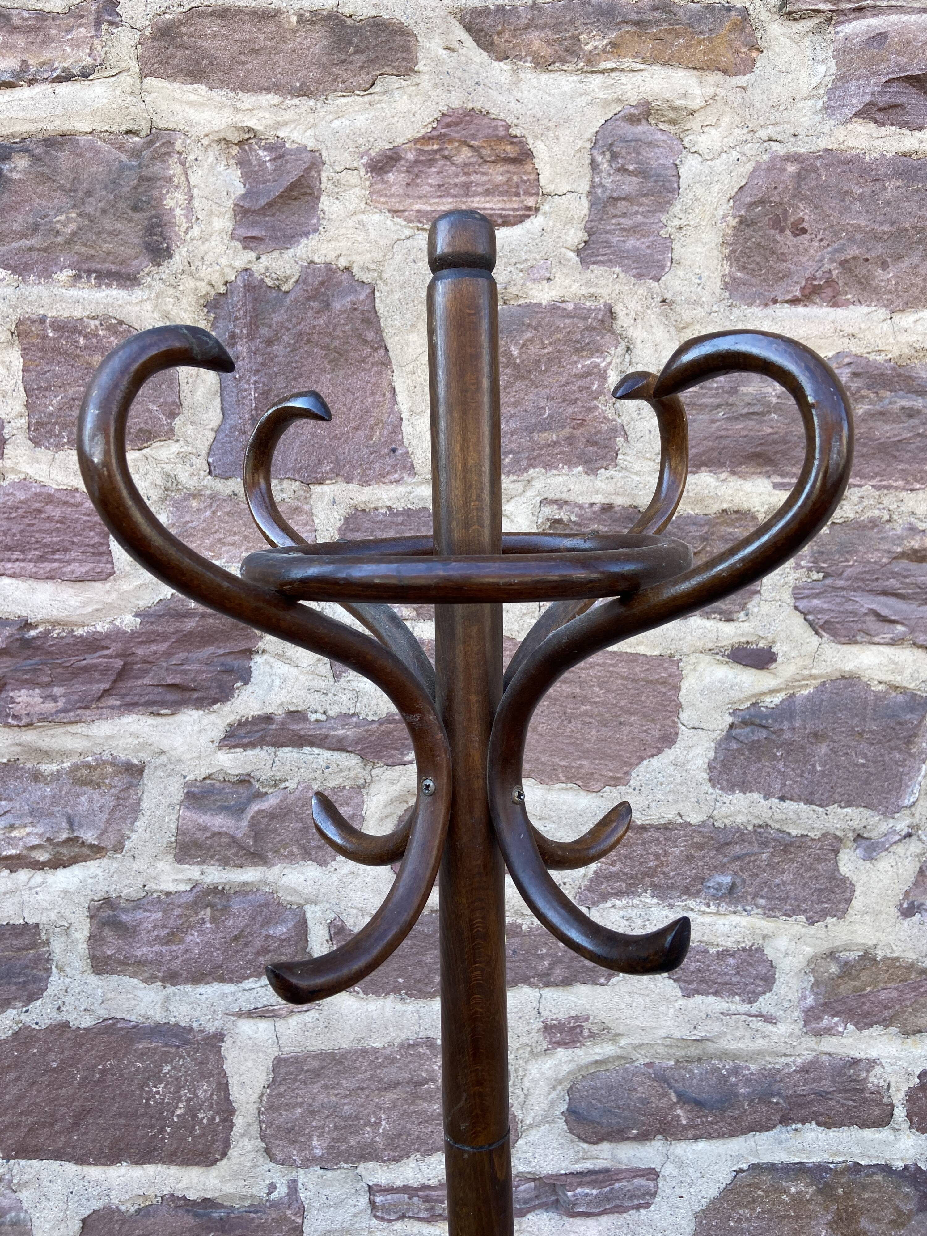 Baumann coat rack on vintage parrot stand
