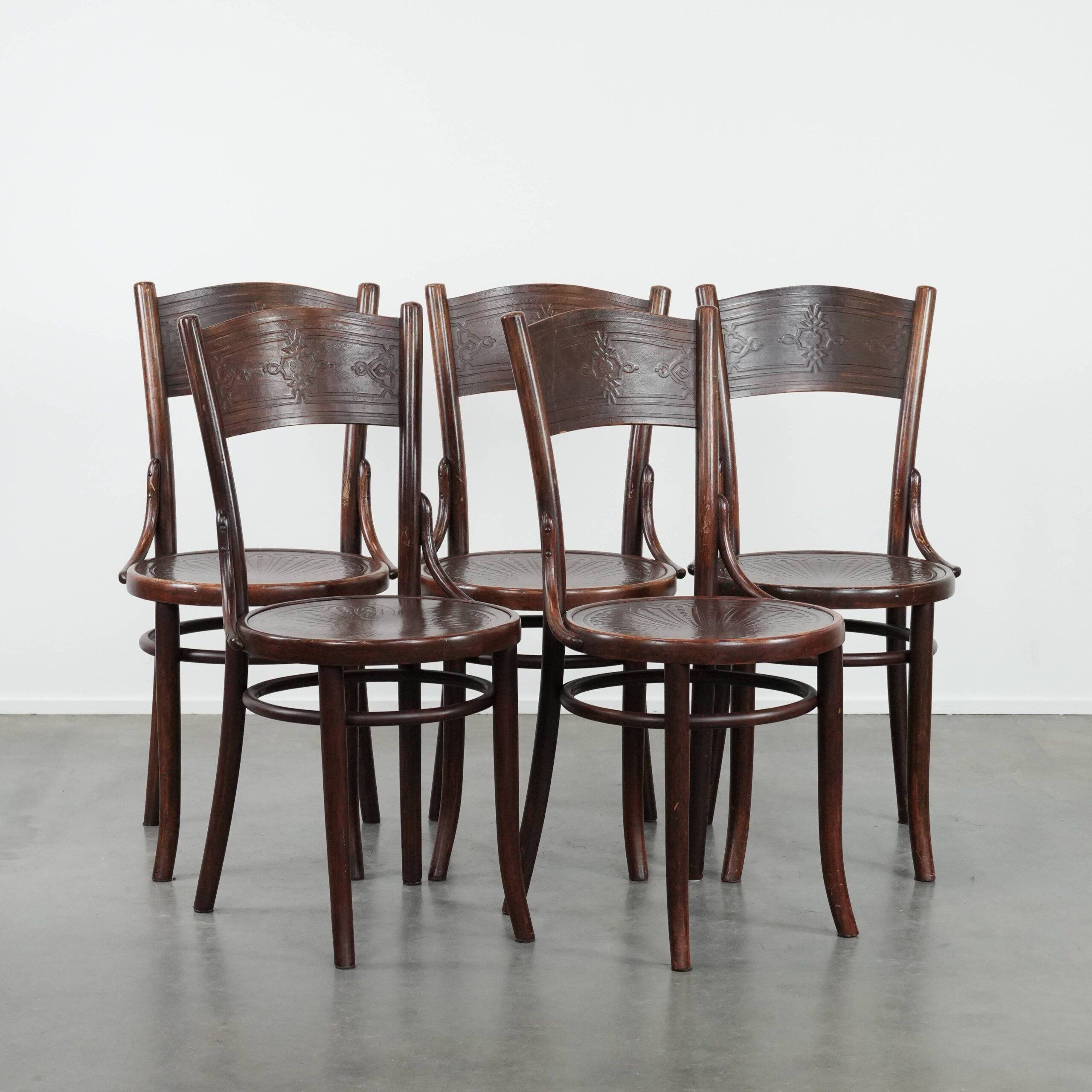 Set of five vintage wooden Cosmos bistro design chairs with stunning detail