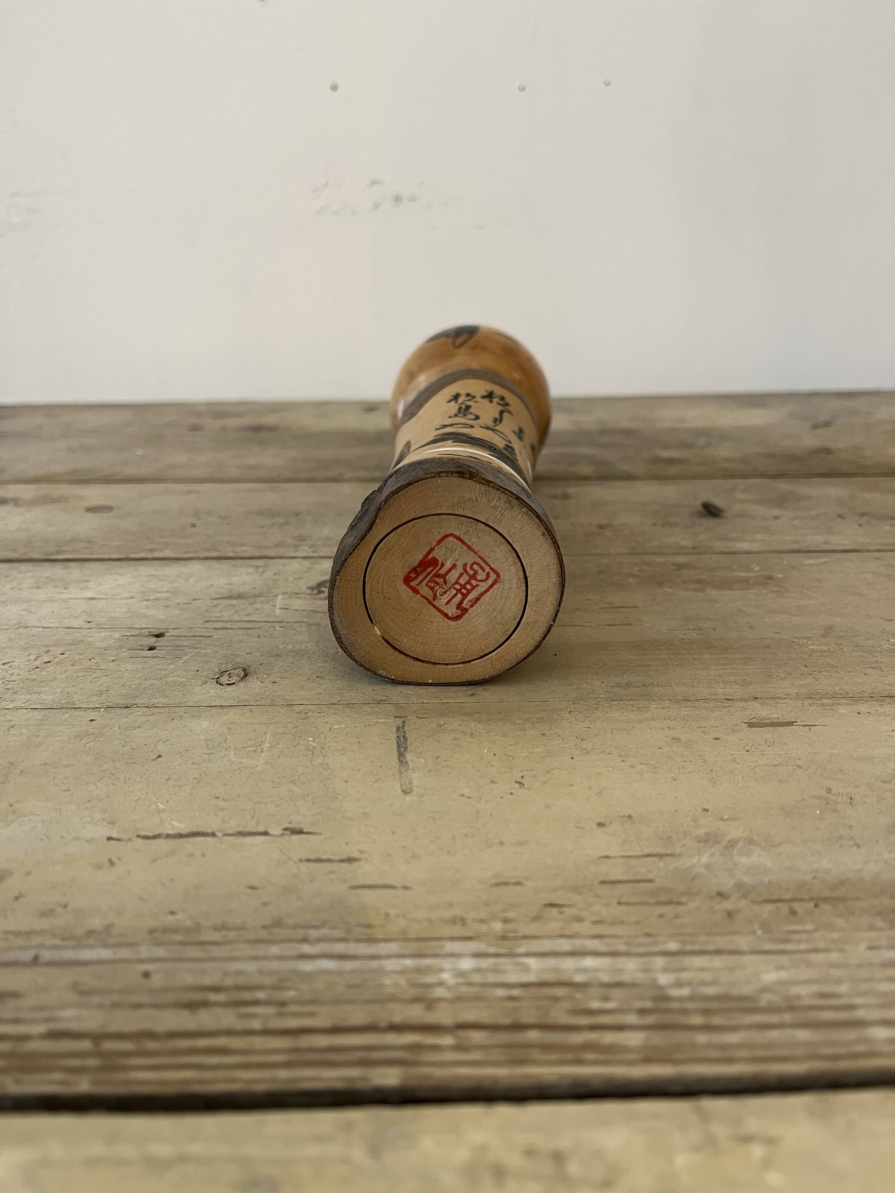 Old wooden kokeshi