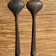 Pair of salad servers or kitchen utensils in blackened teak L30 D9