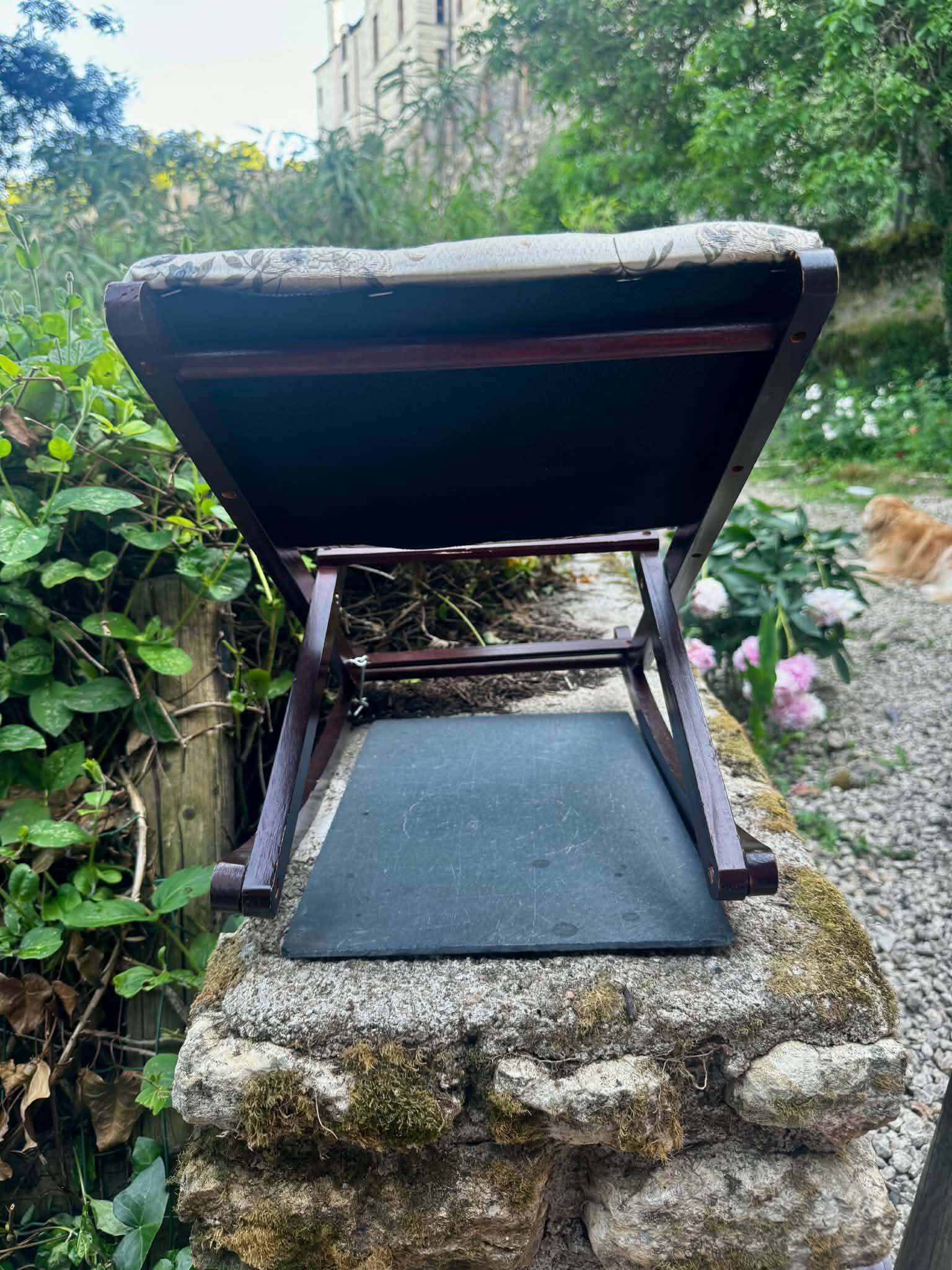Folding footrest with vintage embroidery