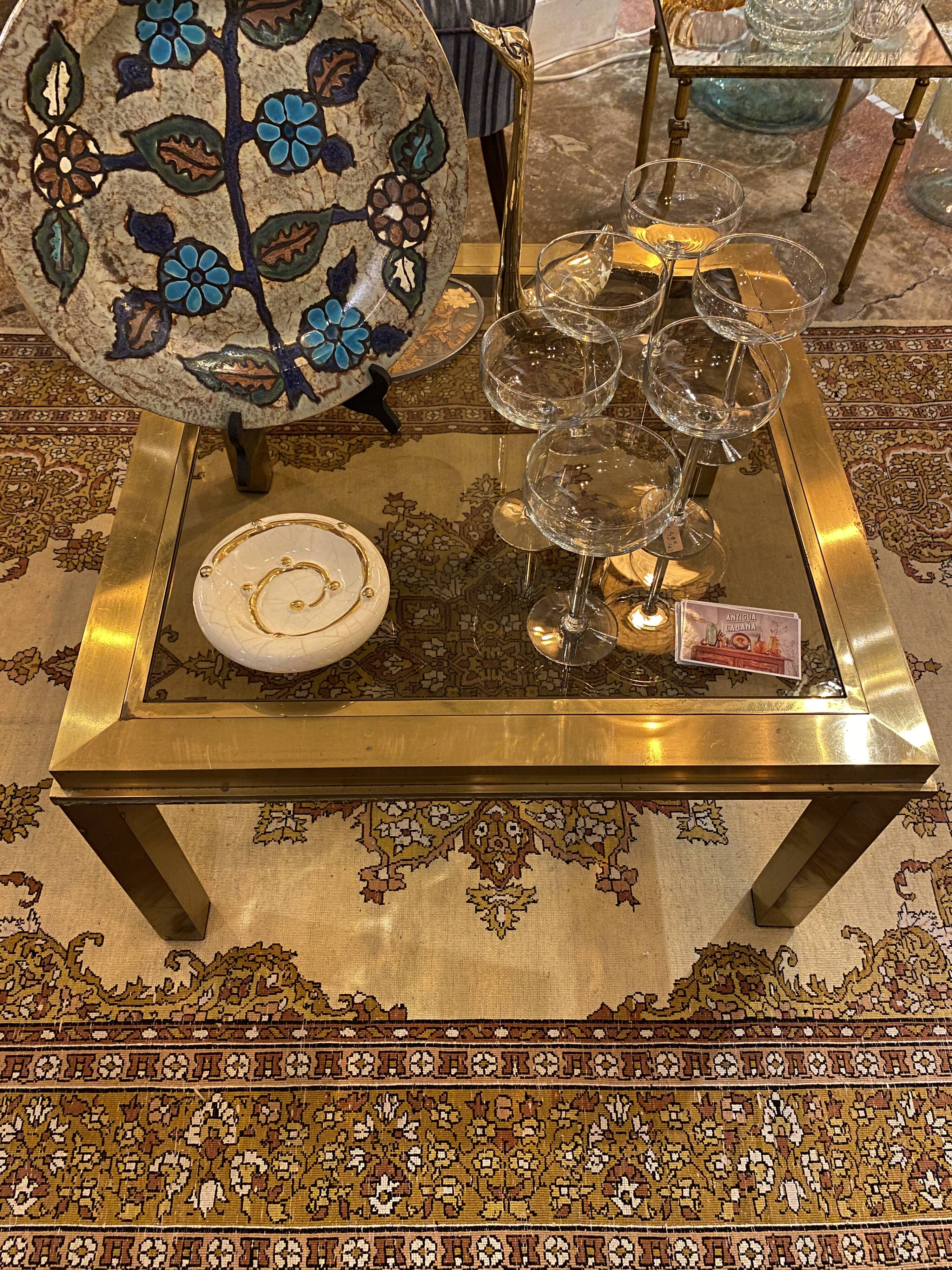 Gold square coffee table and smoked glass