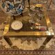 Gold square coffee table and smoked glass