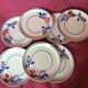 Set of 7 porcelain dessert plates