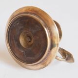 Brass candle holder with cup and handle