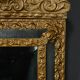 Small Mirror with Parcloses in Repoussé Brass – 1900