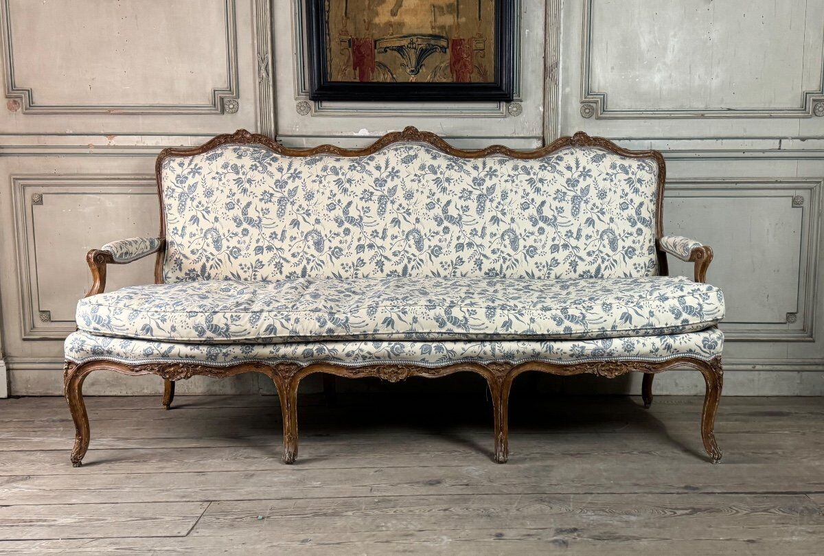 Louis XV bench in carved wood with oak patina, 18th century