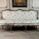 Louis XV bench in carved wood with oak patina, 18th century