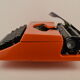 Typewriter brother 210 orange 1975
