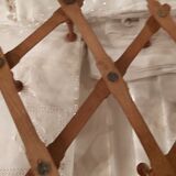 Extendable wall coat rack