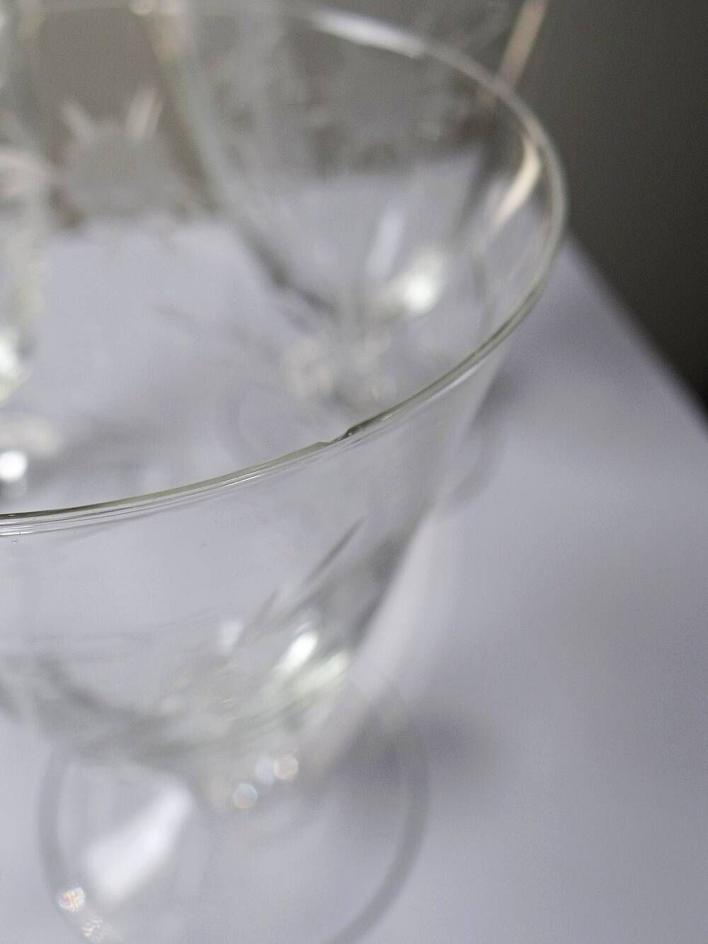 8 engraved crystal wine glasses with a floral design, Bohemia, early 20th century.