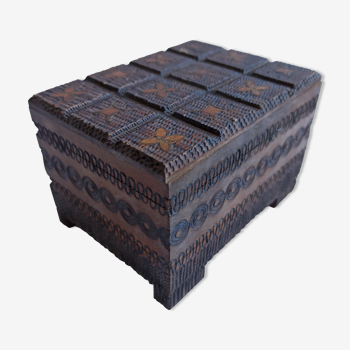 Vintage box made of carved wood and brass