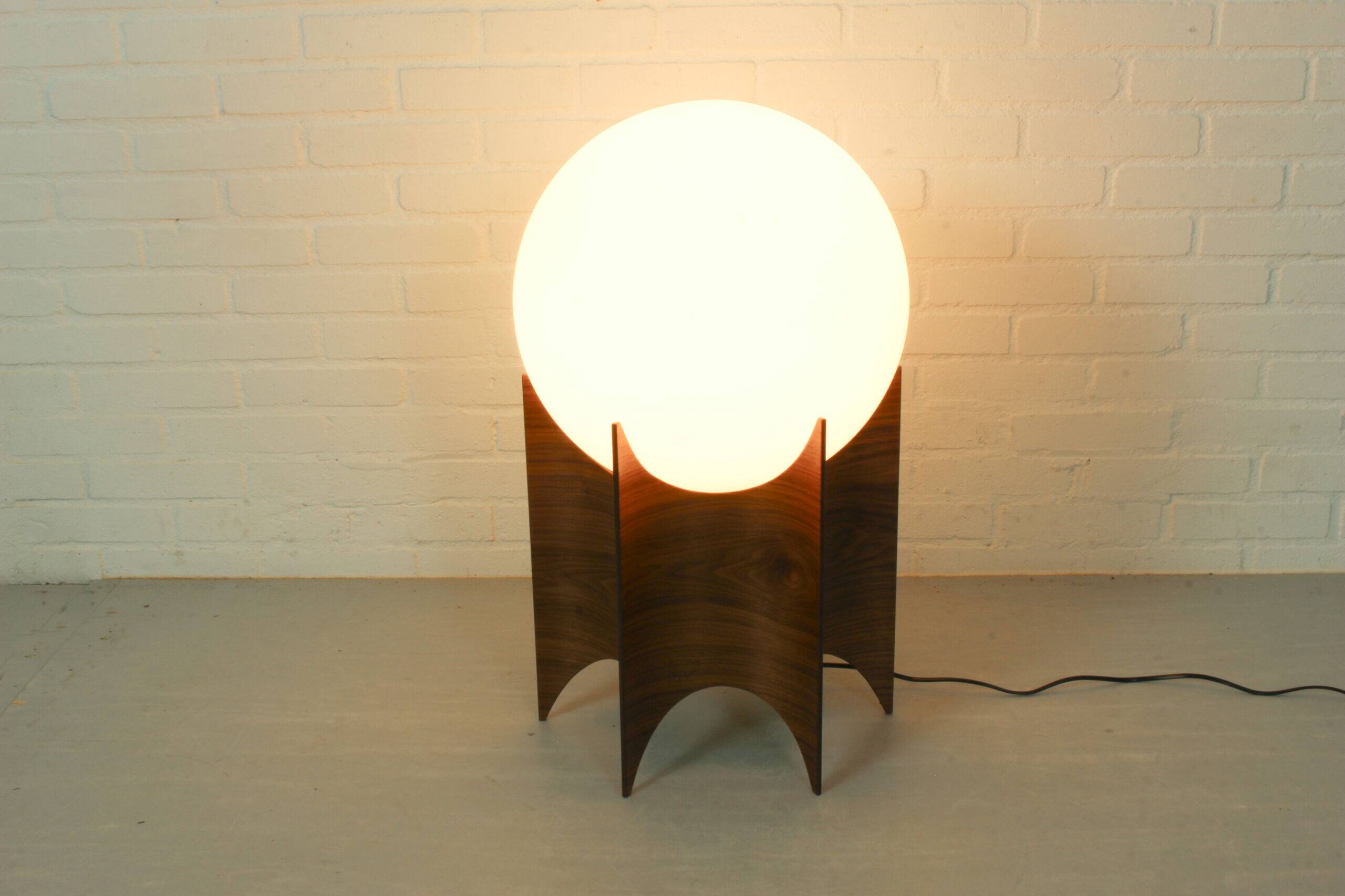 Vintage globe lampshade with sculptural wooden base