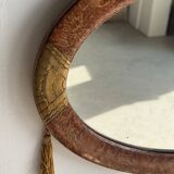 Small oval Art Deco mirror in brown and gold 33x54.