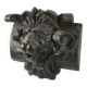 Sculpture de tête de lion en bois teinté