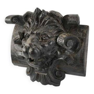 Sculpture de tête de lion en bois teinté