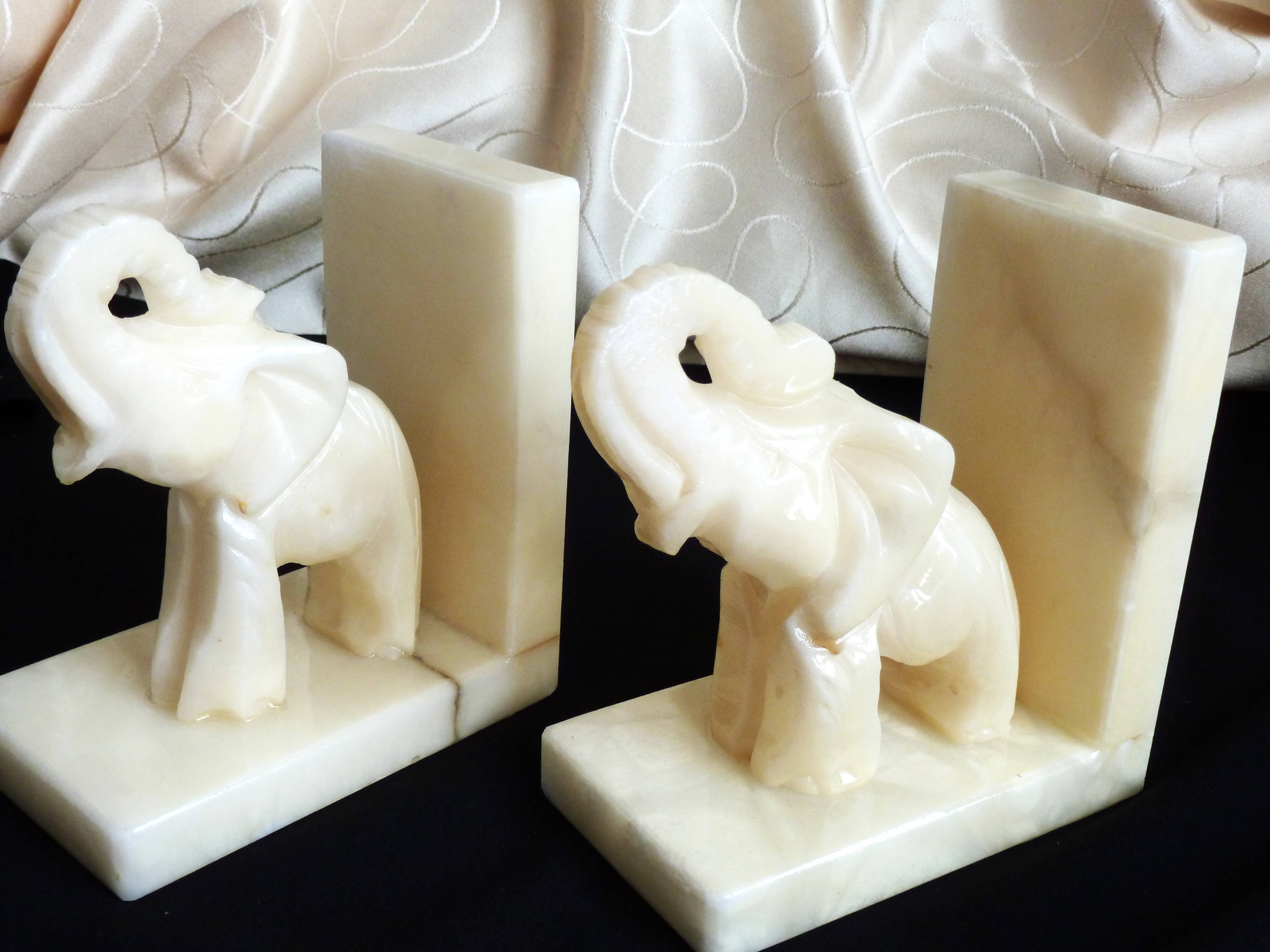 Pair of alabaster elephant bookends, library accessories