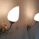 Articulated brass and opaline wall lights - mid 20th century.