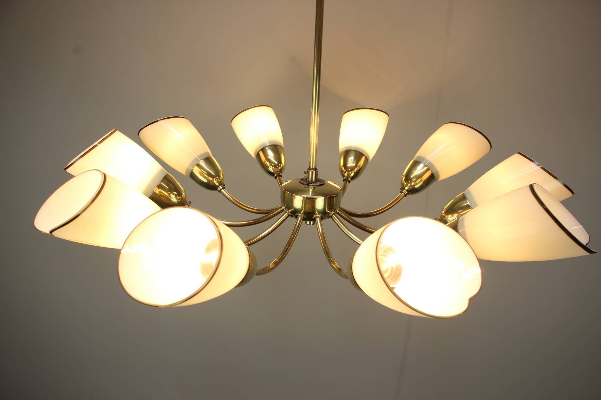 Brass and glass ten-arm chandelier from the mid-century, 1960s.