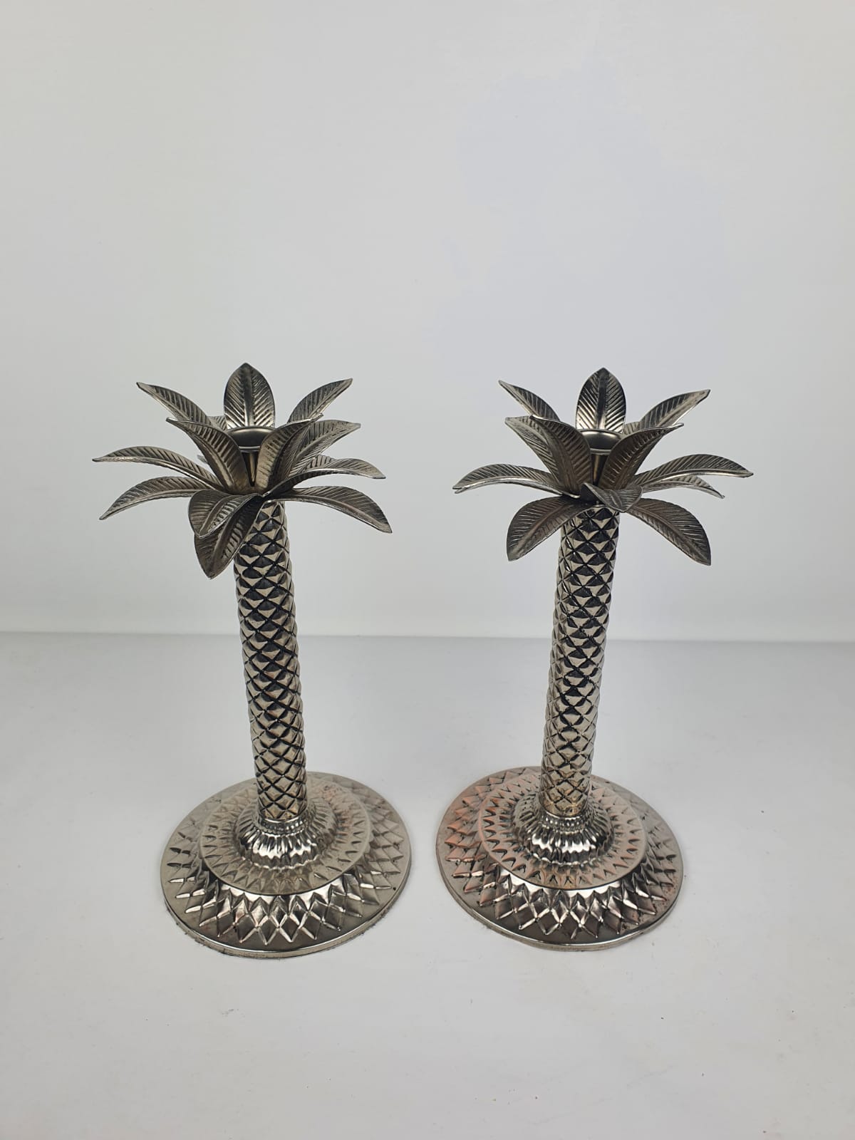Pair of Palmtree design candle holders
