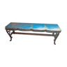 Wooden bench and vintage colored wrought iron